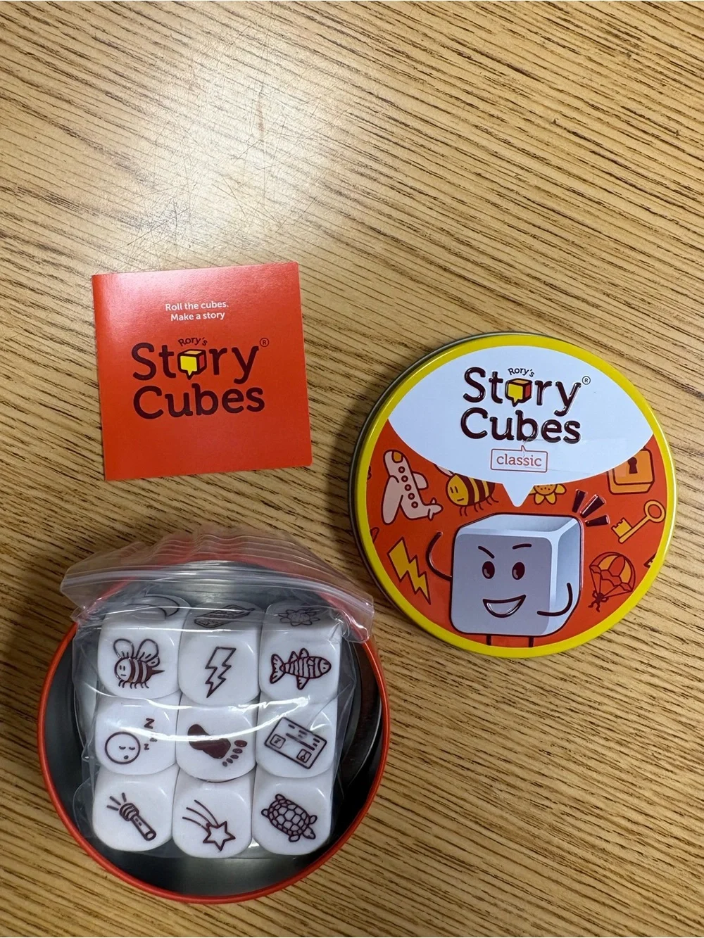 Rory’s Story Cubes Classic 9 Dice Storytelling Game Tin Complete Asmodee